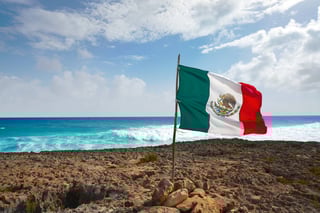 Mexican flag by the ocean