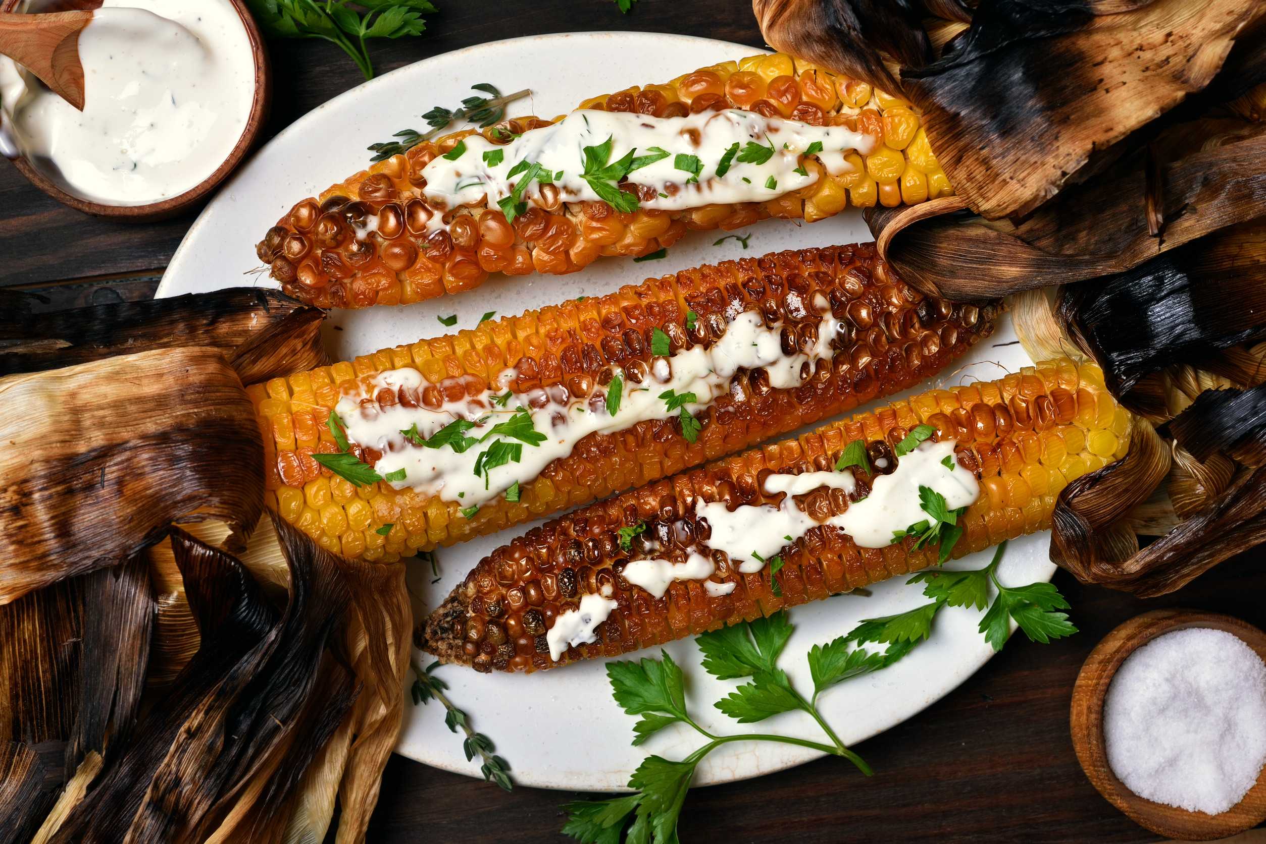 Grilled Mexican elote with sauce Grilled Mexican elote with sauce