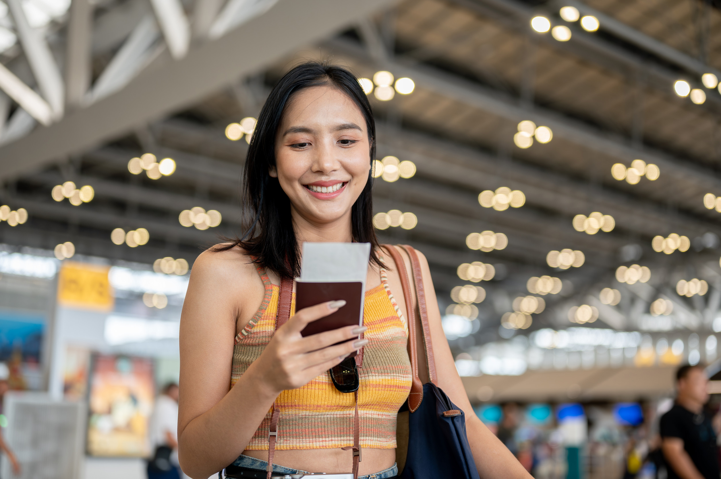 Smiling Young Asian Female Tourist Passenger