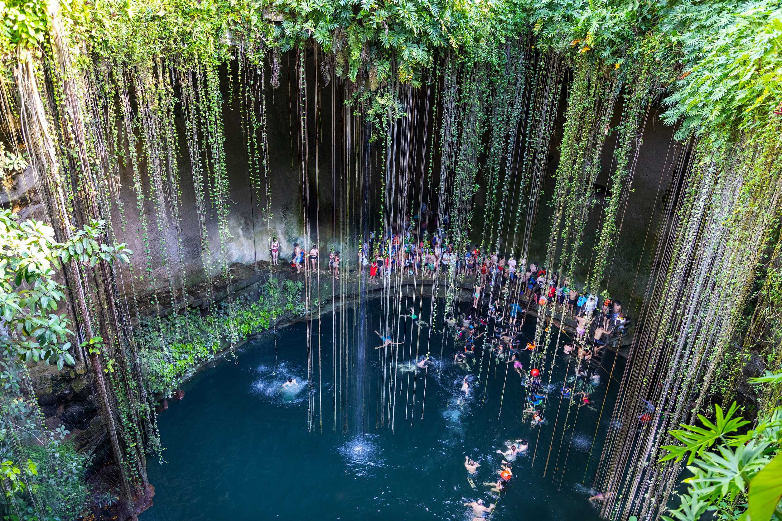 Swimming At Cenote Ik Kil